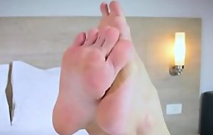 Crude ladyboy toe teasing with her toes