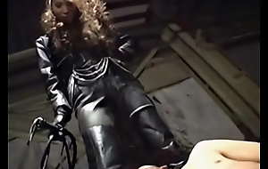 Asian femdom full leather pants and jacket trampling ball kicking with long fetish boots