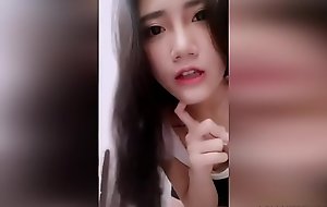 Amateur youthful chinese girl masturbates beside a fake penis