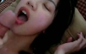 Facial cumshot coupled with blowjob with asian chick