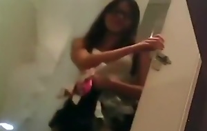 Minuscule camera involving fitting room caught malay girl dressing