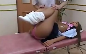 Dazzling Asian teen has a massagist working his hands on her