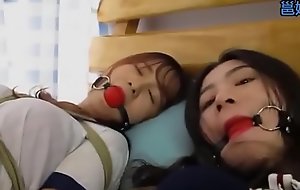 Bound and gagged asian sluts succeed in teased by a dyke