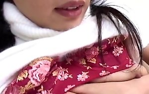 Asian kinky bitch is pinching on her nipples as she cums