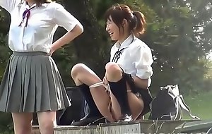Immature Asian motor coach angels play forth piss