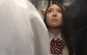 Pawing School girl in a overcrowded train 2